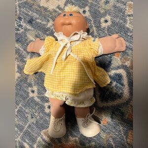 Cabbage Patch Kid in White-Trim Outfit